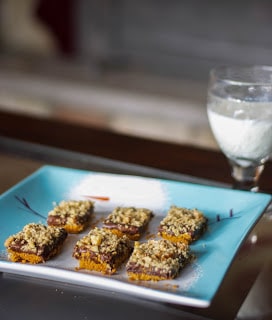 A plate of food on a table, with Chocolate and Walnut