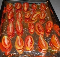 A close up of food, with Tomato