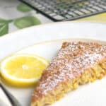 A piece of cake on a plate, with Almond torte