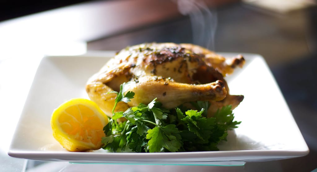 Cornish hens roasted with fresh squeezed lemon juice, garlic powder, Kosher salt and black pepper with a white wine pan gravy. 