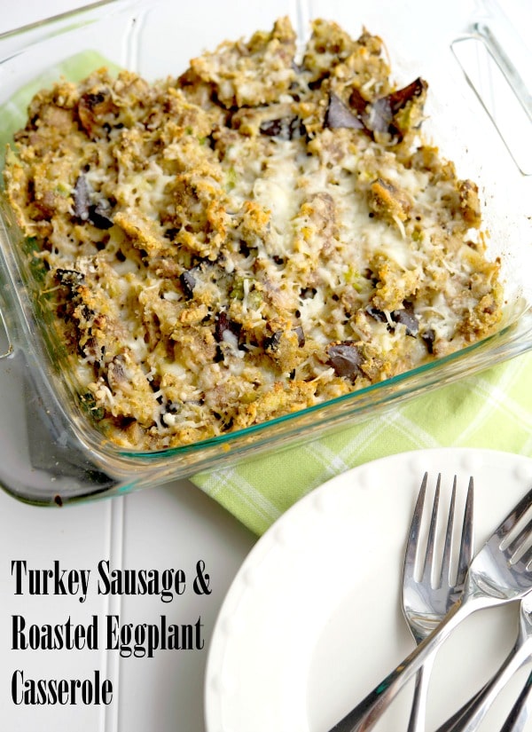 A plate of food with a fork, with Sausage and Casserole