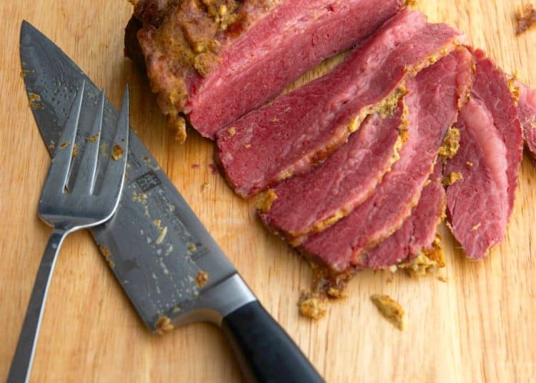 Corned Beef slowly simmered in beer; then baked with a mustard horseradish crust.