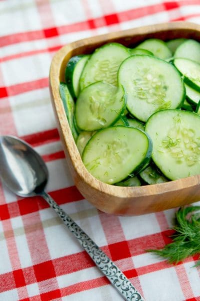 Dilled Cucumber Salad made with fresh garden cucumbers, dill, vinegar and oil is a deliciously light summertime salad.