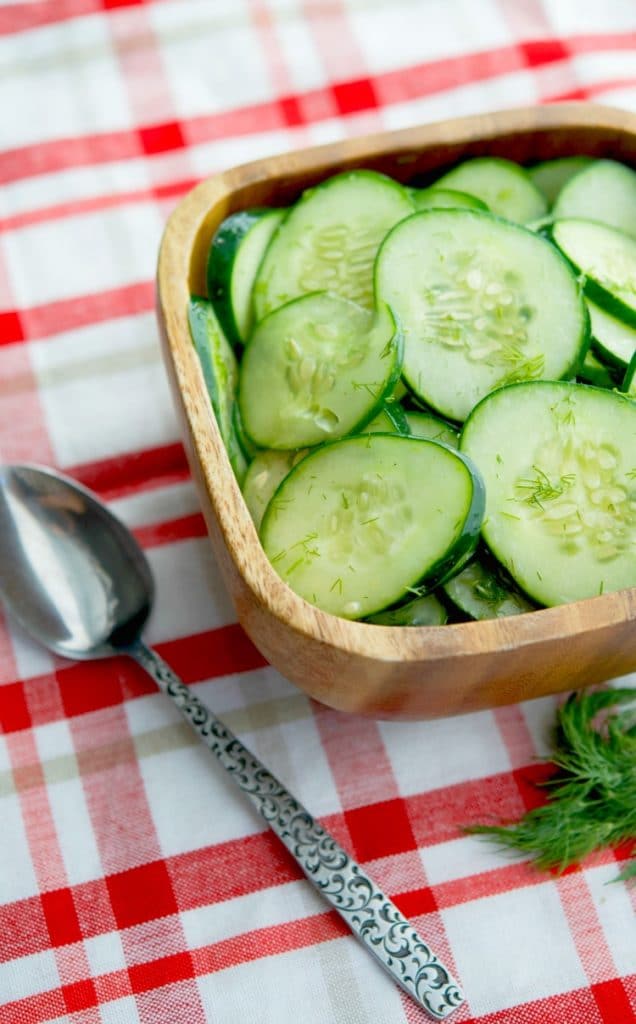 Dilled Cucumber Salad made with fresh garden cucumbers, dill, vinegar and oil is a deliciously light summertime salad.