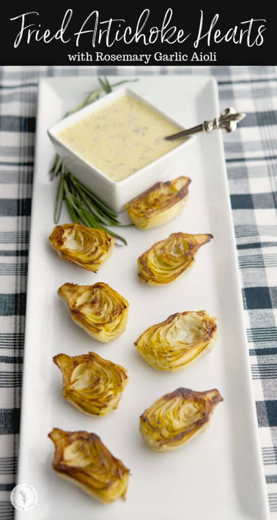 fried artichoke hearts on a white platter