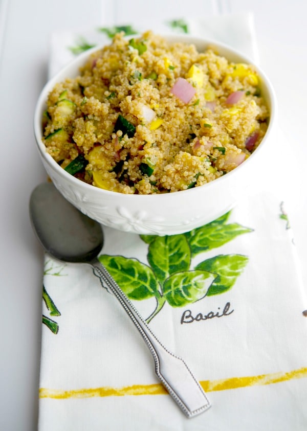 Grilled Squash Quinoa Salad in a white bowl. 