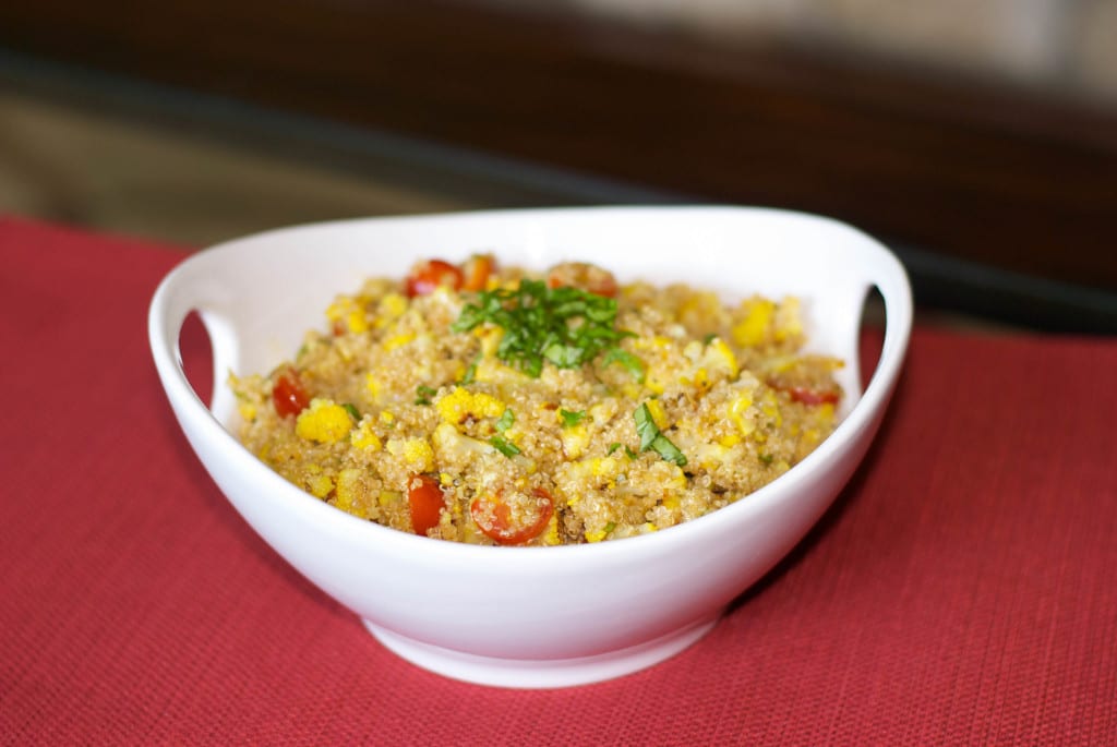 A bowl of food on a table, with Salad and Stuffing