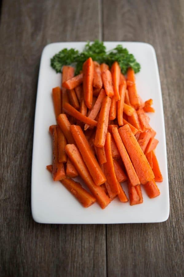 Add these flavorful Cinnamon Carrot Sticks to your weeknight vegetable side dish rotation. They're super easy and delicious!  