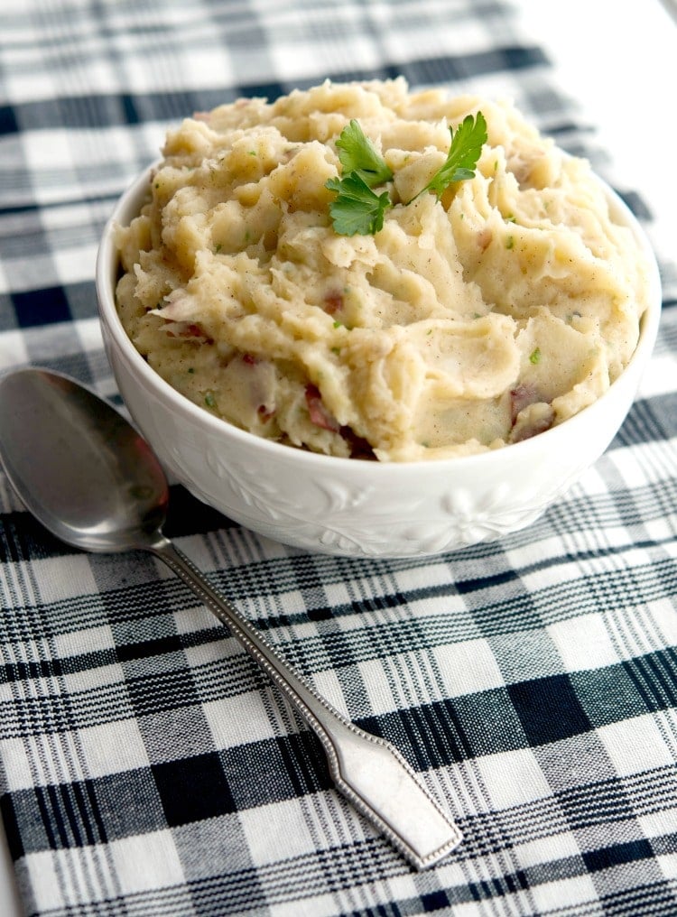 Mashed potatoes made with orange juice and ground cinnamon in a bowl. 