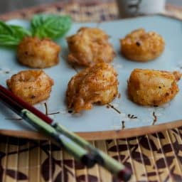 A close up Tomato Basil Tempura Style Shrimp