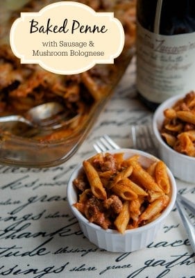 Baked penne with sausage and mushroom bolognese in a bowl