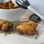 Buttermilk Fried Chicken on parchment paper.