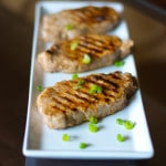 Lemon Ginger Grilled Pork Chops made with center cut boneless pork chops marinated in lemon juice, ginger, honey and soy sauce; then grilled.
