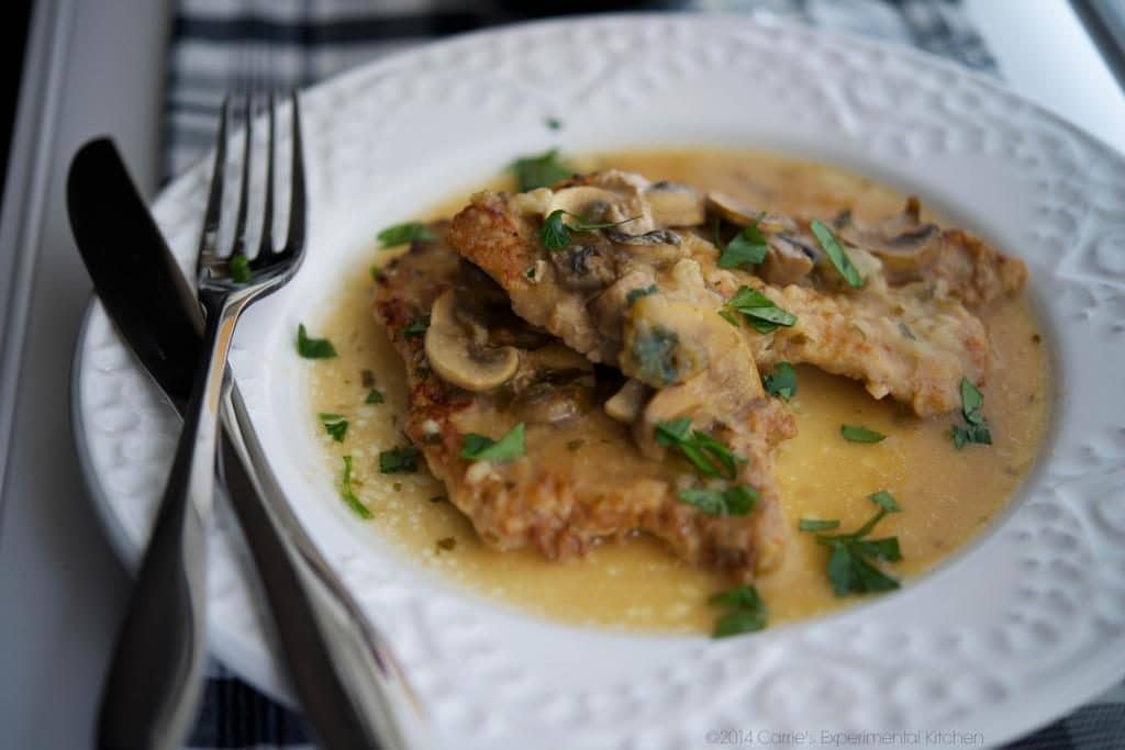 Pork Marsala on a white plate. 