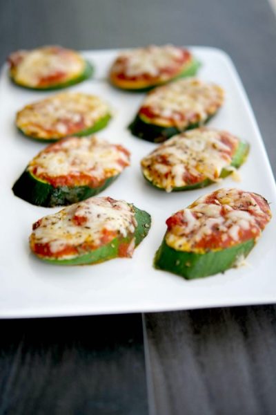 Turn your garden fresh zucchini into a healthy snack or appetizer with these Zucchini Pizzas. The kids will love them.