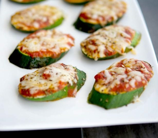 Turn your garden fresh zucchini into a healthy snack or appetizer with these Zucchini Pizzas. The kids will love them.