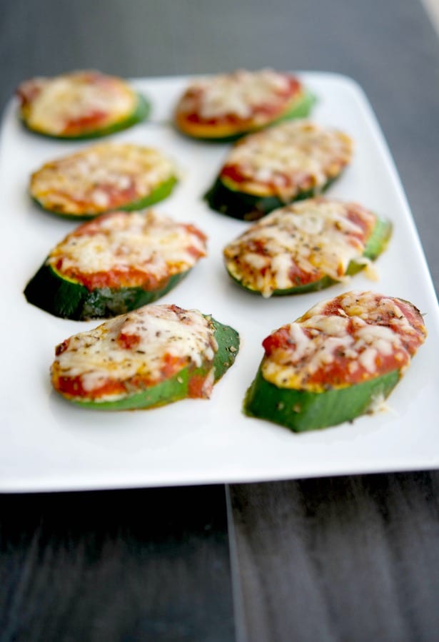 Turn your garden fresh zucchini into a healthy snack or appetizer with these Zucchini Pizzas. The kids will love them.