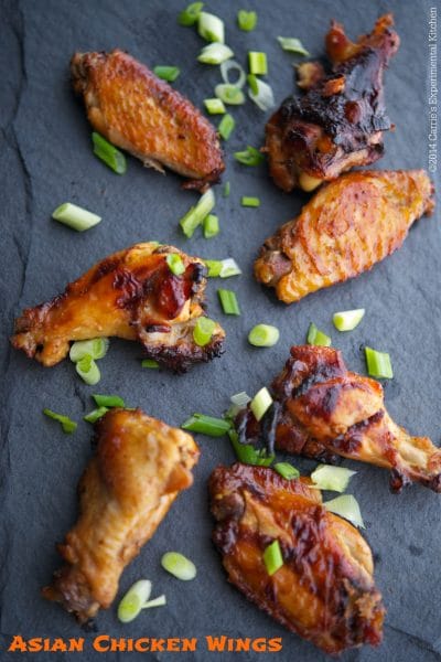 Asian Chicken Wings on a slate board.