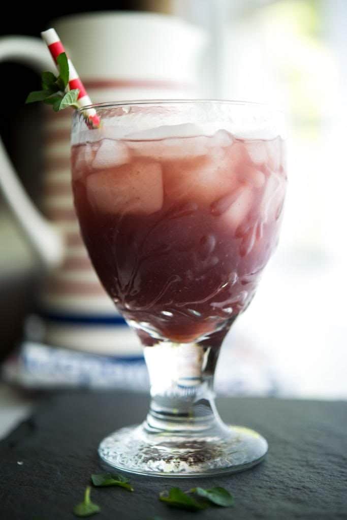 Green tea brewed with fresh blackberries and mint leaves is a flavorful, cool drink you can enjoy all year long. 