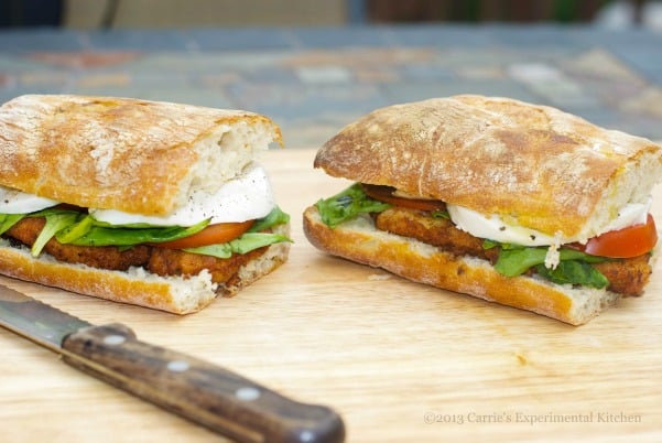 Chicken Cutlet Sandwich with Campari Tomatoes, Fresh Mozzarella and Basil topped with Aged Balsamic Vinegar.