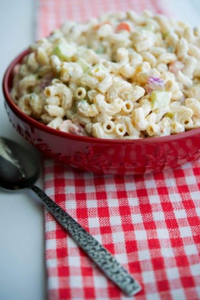 Garden Macaroni Salad made with fresh tomatoes, cucumbers, celery, carrots and onions is the perfect summer salad.