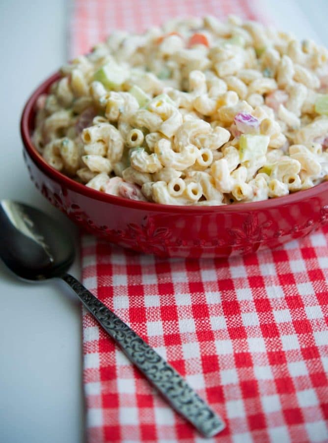 Garden Macaroni Salad made with fresh tomatoes, cucumbers, celery, carrots and onions is the perfect summer salad.