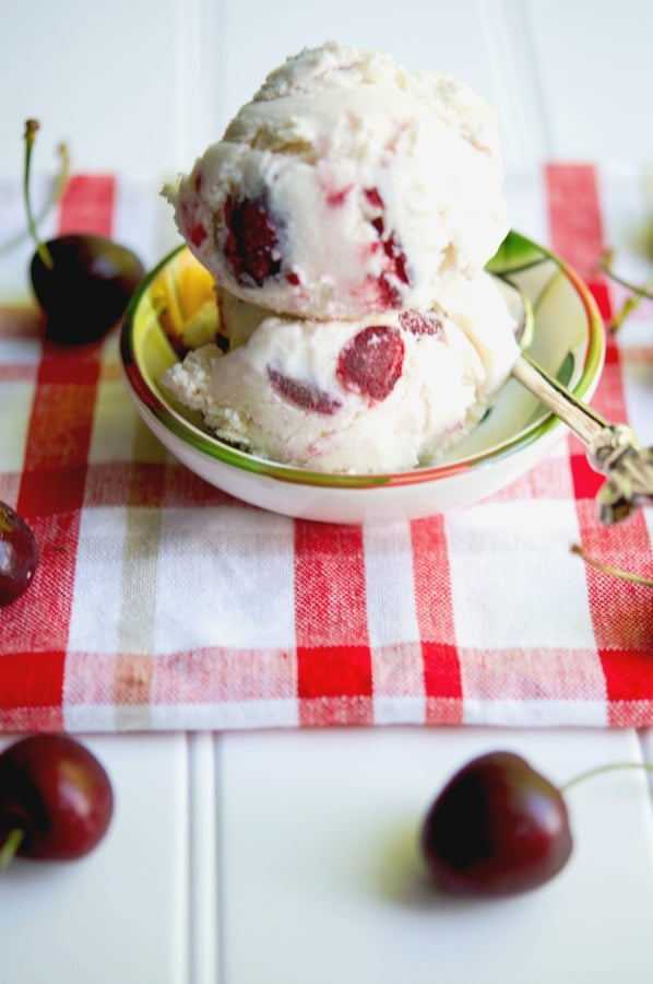 This homemade Cherry Vanilla Ice Cream made with fresh cherries, Madagascar vanilla, heavy cream, milk and sugar is super creamy and refreshing.