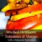 Sweet mangoes and fresh, ripened Heirloom Jersey tomatoes stacked, then topped with a balsamic reduction.