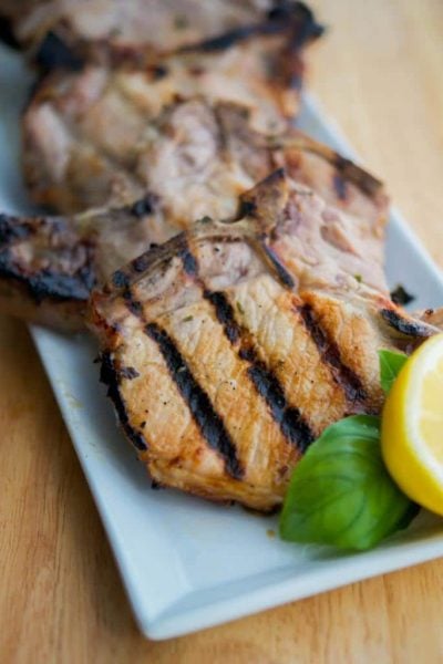 A plate of lemon basil grilled pork chops