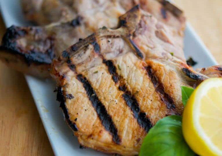 A plate of lemon basil grilled pork chops