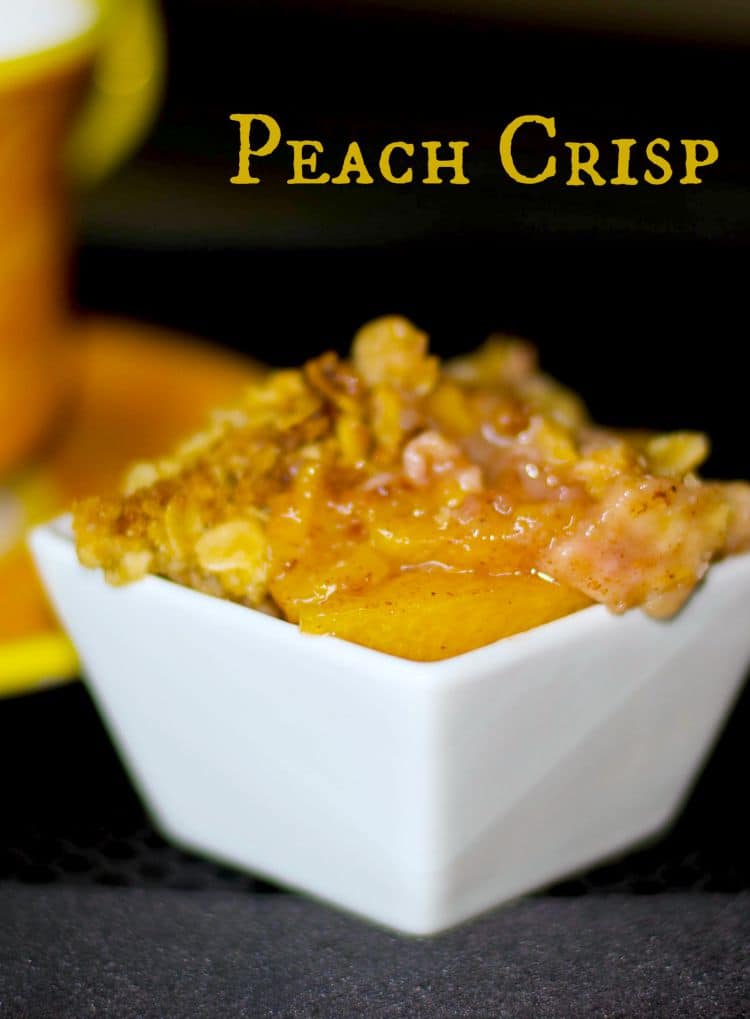 Peach Crisp made with fresh Summer peaches topped with an oatmeal streusel topping; then baked until hot and bubbly.
