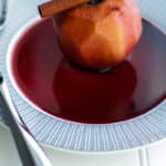 Cortland apples slowly poached in red wine Chianti, sugar, vanilla extract and cinnamon sticks make a tasty Fall dessert. 