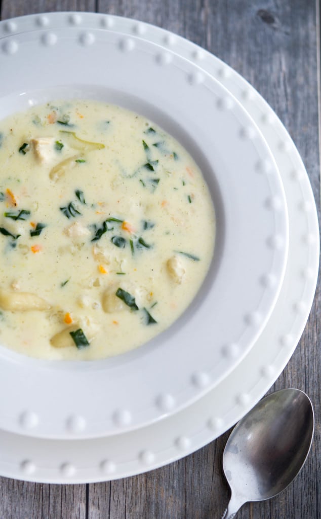 Olive Garden copycat recipe for Chicken Gnocchi Soup in a white bowl. 