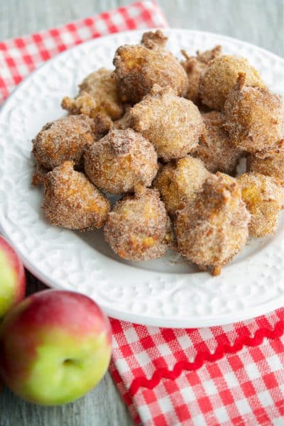 Apple Cider Fritters are delicious and made with warm bits of apple, fresh apple cider with a cinnamon and sugar topping.