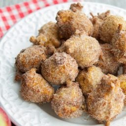 A plate of apple fritters.