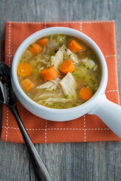 Learn how to make homemade Chicken Noodle Soup using the carcass of a whole roaster chicken. It's simple to make & a staple during those cold winter months.