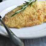 Cornmeal Crusted Baked Chicken: Bone in chicken breasts crusted with a mixture of cornmeal and fresh rosemary; then baked until golden brown.