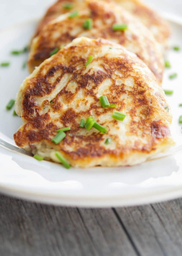 Turn leftover mashed potatoes into a new tasty side dish with all of your favorite toppings into one delicious potato fritter. 