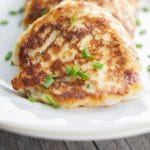 A plate loaded mashed potato fritters.