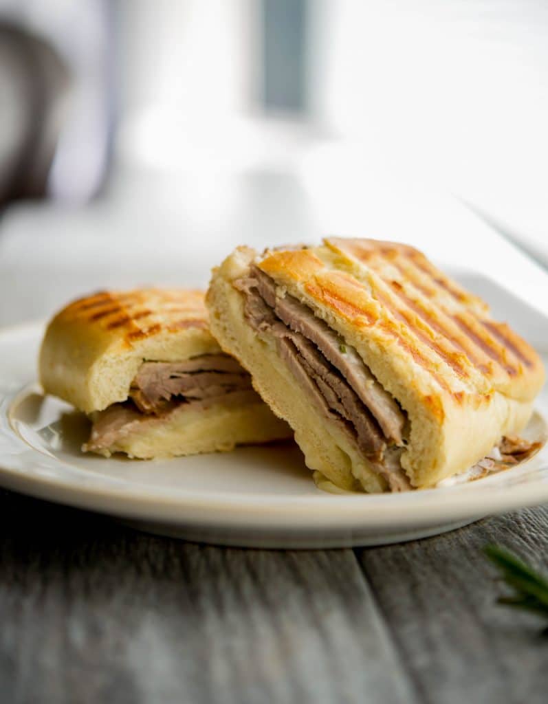 Roast Beef, Asiago cheese, and rosemary mayonnaise on grilled Ciabatta bread is a tasty way to utilize leftover roast beef for lunch or dinner. 