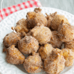 a plate of apple cider fritters