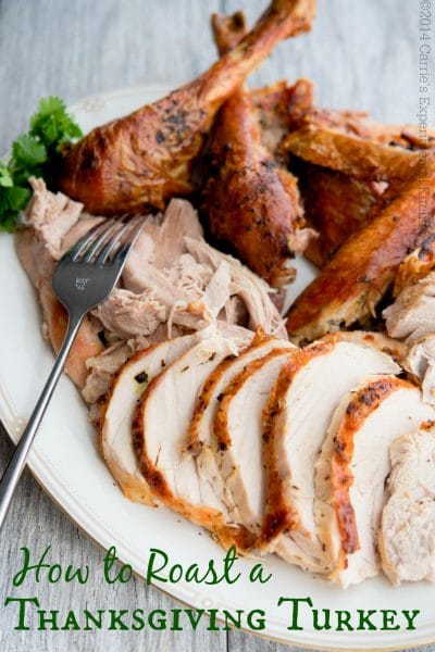 Carved Butter & Herb Roasted Turkey on a platter.