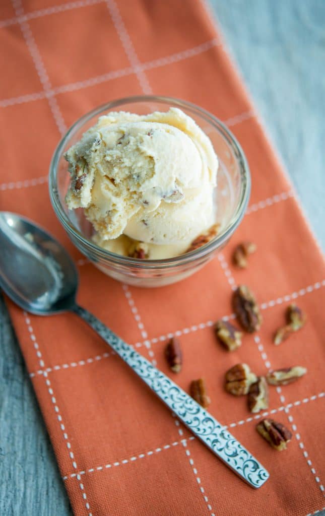 Pumpkin Maple Pecan Ice Cream made with wholesome ingredients like half and half, milk, sugar, pumpkin, maple syrup and pecans. 