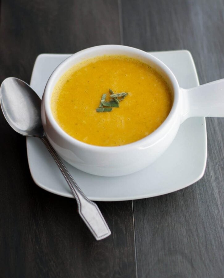 carrot and sage soup in a bowl