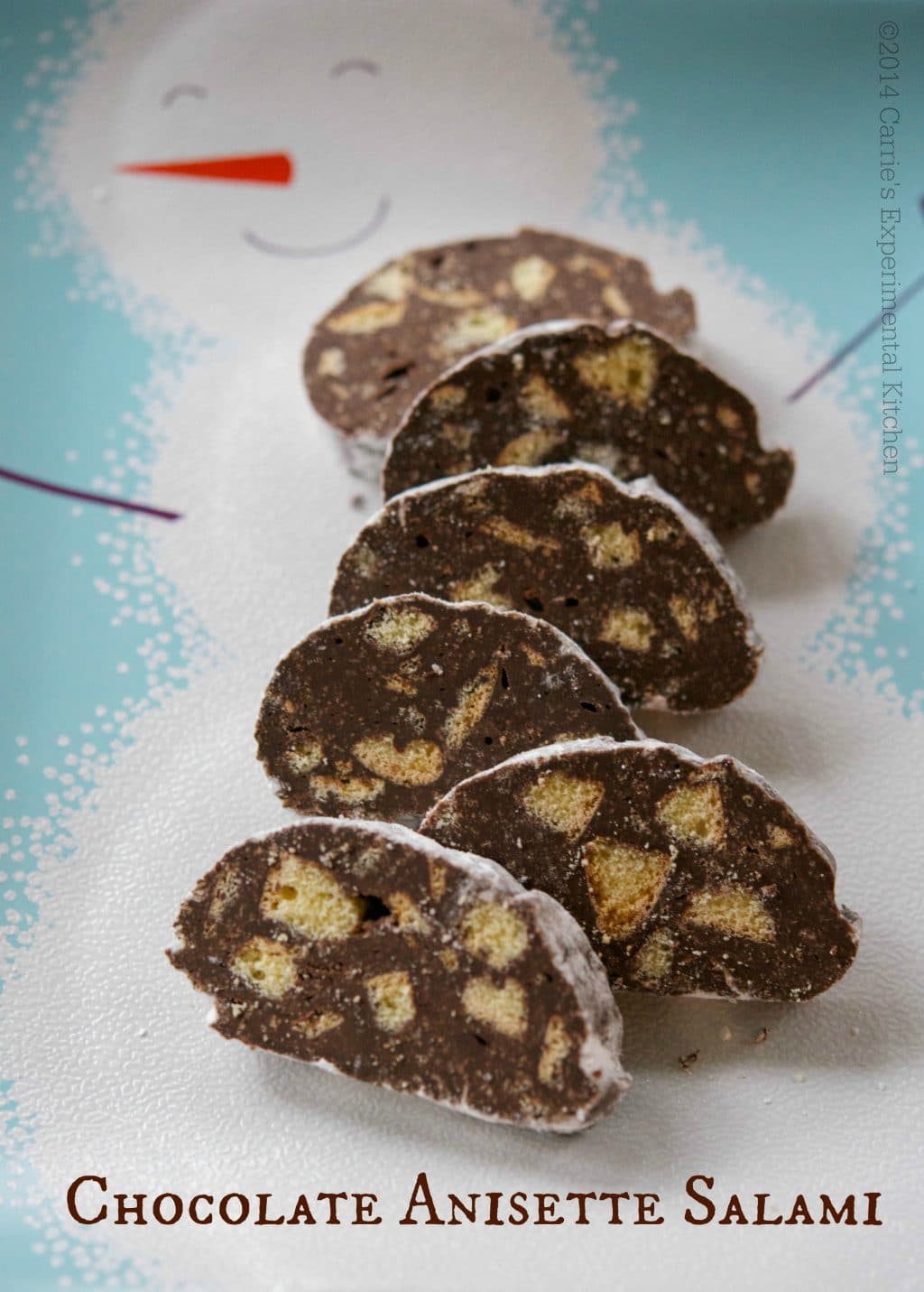 Chocolate Anisette Salami on a winter plate. 