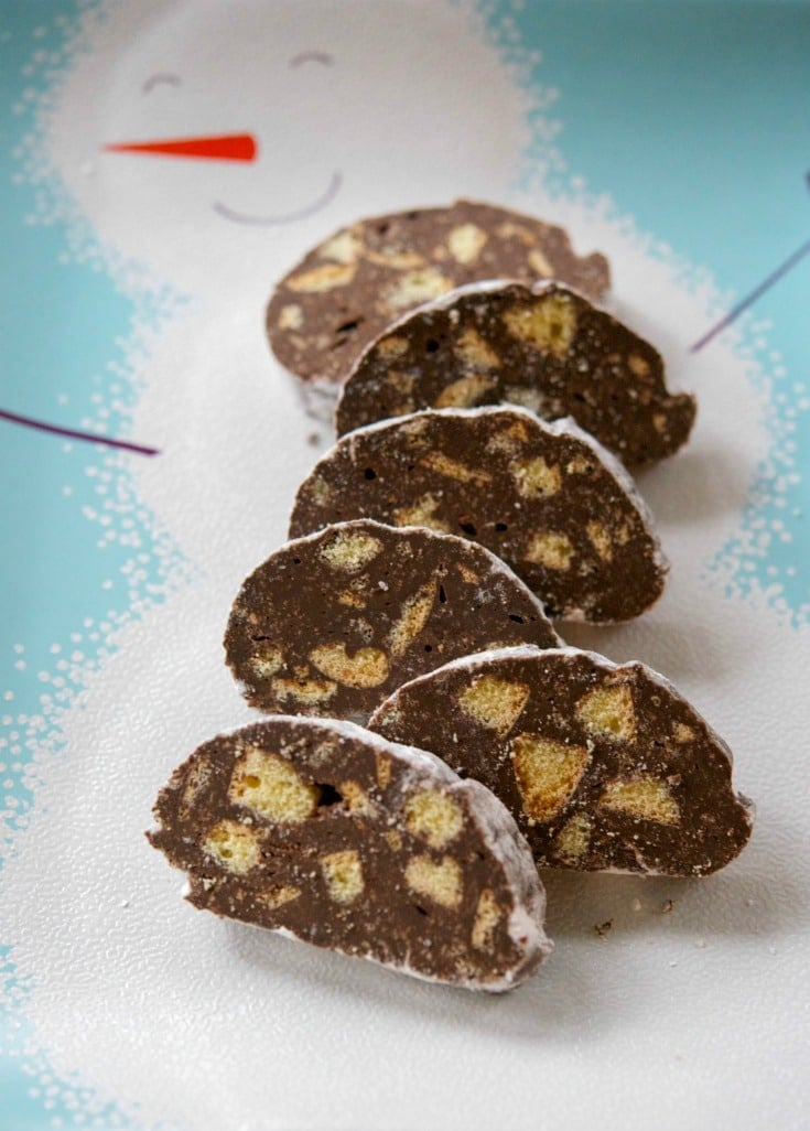 chocolate anisette salami on a snowman plate