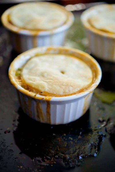 Individual Beef Pot Pie made with cooked roast beef and vegetables in a beef gravy; then topped with a buttery pie crust.