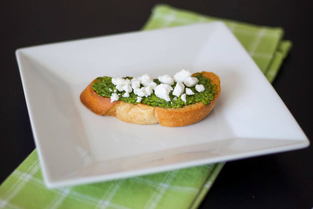 Pesto Goat Cheese Crostini on plate