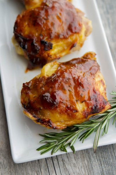 A close up of a plate of Balsamic Apricot Chicken Thighs.