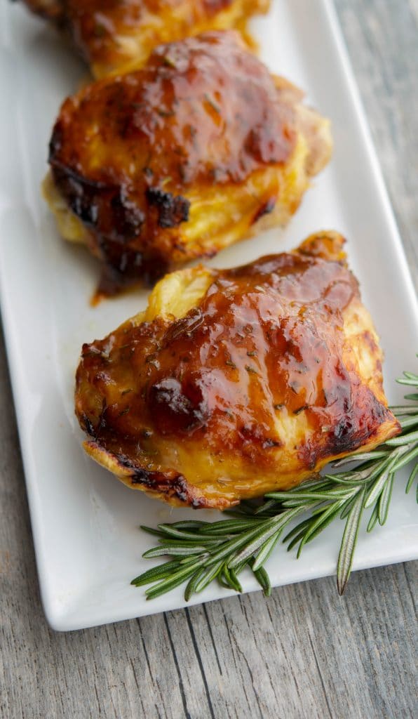 Balsamic Apricot Chicken thighs on a white platter